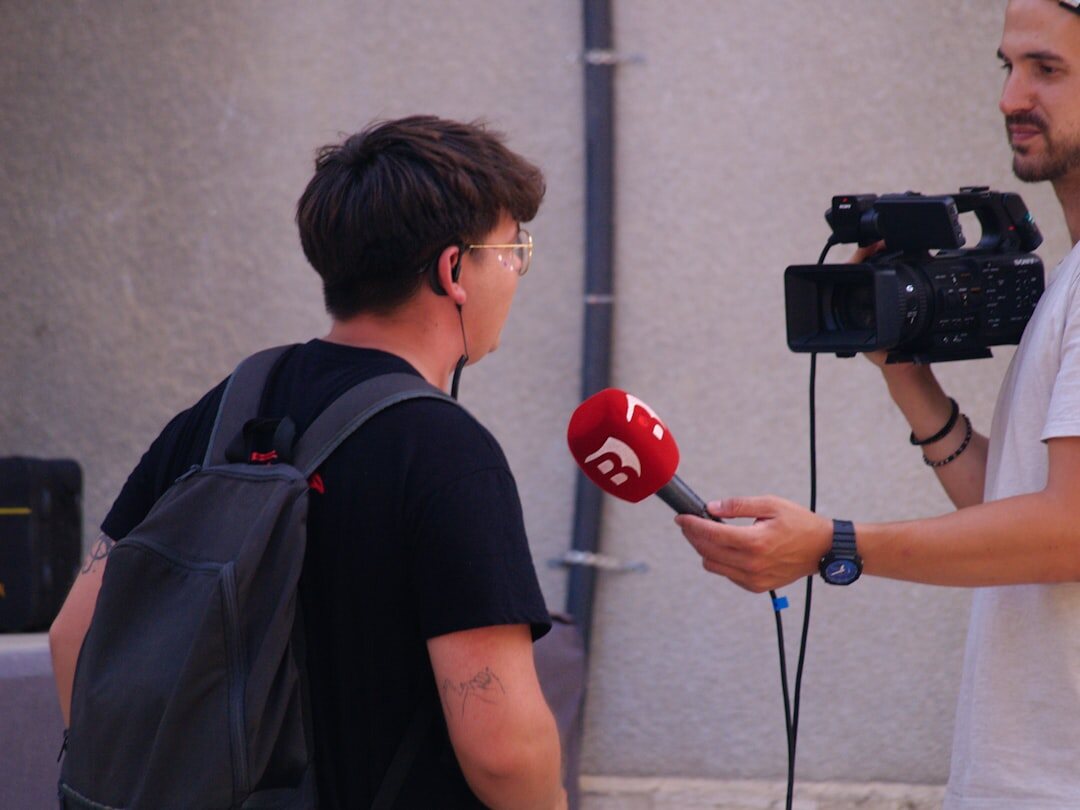 camera crew filming interview